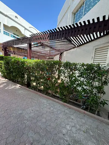 The most stylish and spacious two-bedroom apartment in Al Khan, near the lakefront promenade | Garden | Kids' area | Free parking | Prime location
