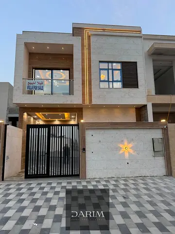 Modern 5BR villa in Al Helio 2 Ajman, spacious layout, high-end finishes, 7 baths, ideal for families, great price, prime growing location.