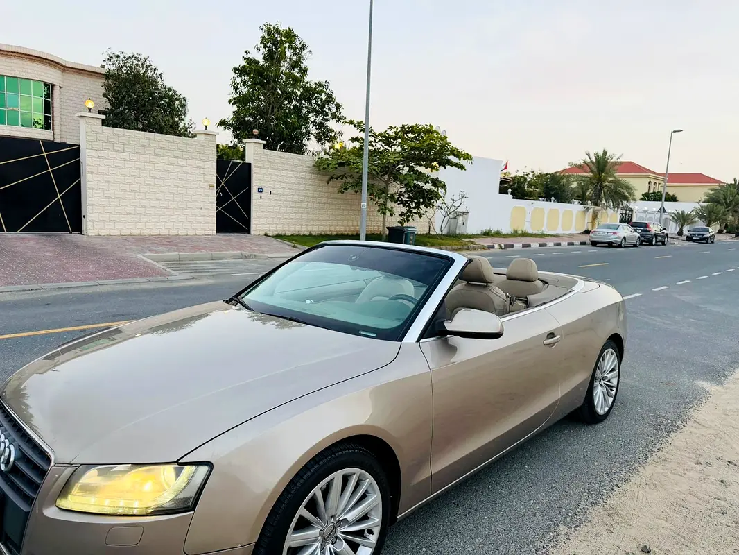 Audi A5 2010 — photo 1 of 7