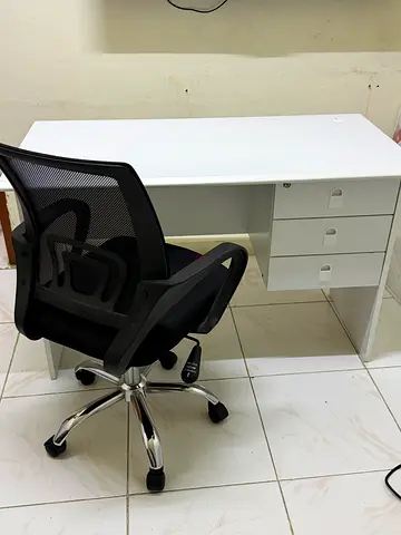 White Office Desk with Black Mesh Ergonomic Chair - Good Condition
