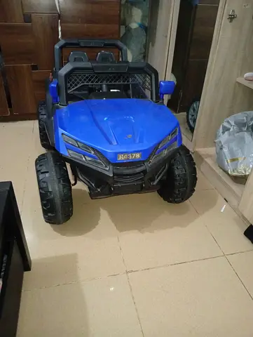 Blue electric ride-on toy car for kids (single-seater)