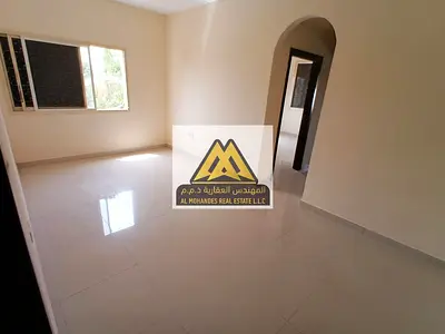 One-bedroom apartment with living room for annual rent in Al Nuaimiya 1, Ajman. Good space, split AC, prime location near services. Price AED 24,000,