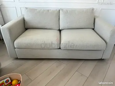Light beige 2-seater sofa in good condition