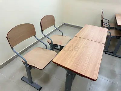 Set of 24 School Desks with Attached Chairs — Light Wood Finish