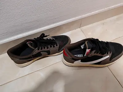 Used black and brown Nike sneakers