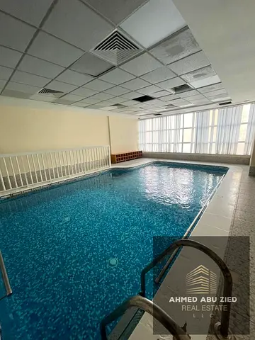 Swimming pool | Gym | Spacious area | Prime location | One-bedroom apartment with a living room in Al Nuaimiya 1, Ajman