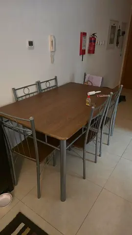 Wooden Top Dining Table with 6 Metal Chairs (Good Condition)