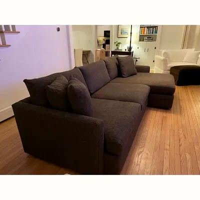 As perfect condition cratebarrel lshape sofa