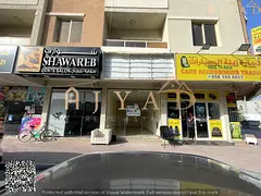 For rent: commercial shop in Al Mowaihat 3 Ajman, near Academy Street, size 24 sqm (259 sq ft), loca