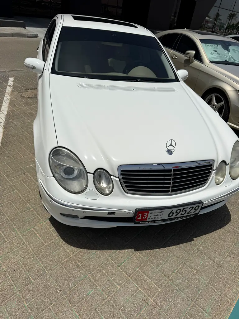 Mercedes-Benz E-Class 2004 — photo 1 of 18