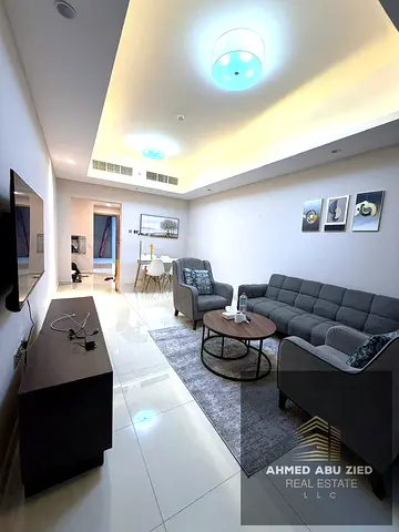 Luxury furnished 1BHK for annual rent in Rashidiya 1 Ajman Gulfa Towers master room balcony free parking gym pool garden 47k yearly 4 cheques