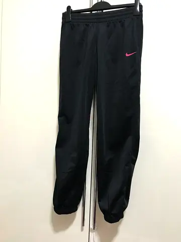 Nike pants for kids aged 13-15 in black color for 65 aed.