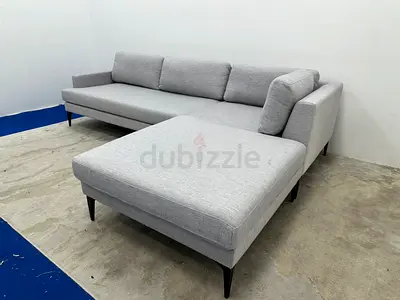 Looks great condition west elm sofa with footstool