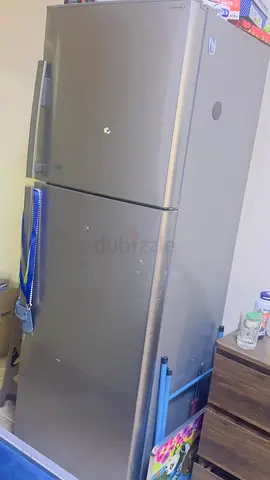 Silver Top-Freezer Refrigerator - Good Working Condition