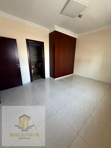 Distinctive apartment for rent in Al Taawun area – new building ✔ Spacious master bedroom ✔ Comfortable living room with a modern design ✔ Two bathro