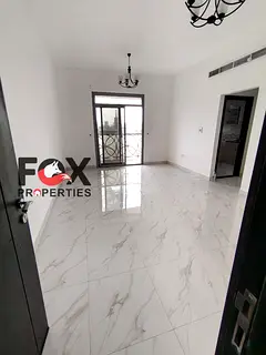 The largest 2-bedroom apartment with a living room, 2 bathrooms, central air conditioning, and a bal