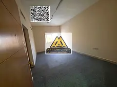 A spacious 1-bedroom apartment with a living room for annual rent in Al Nuaimiya – Ajman, located 