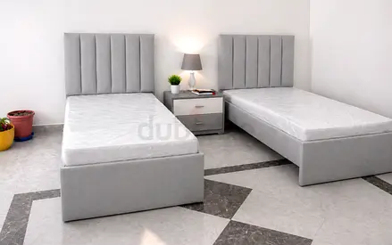 Brand New Pair of Grey Fabric Single Beds with Headboards and Storage Bases