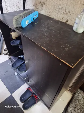 Compact wooden shoe cabinet with 3 shelves - used