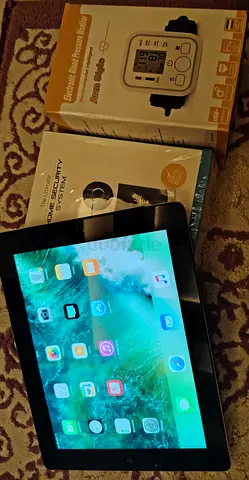 iPad (working) — Black, 9.7-inch — Comes with accessories (new boxed items)fix price