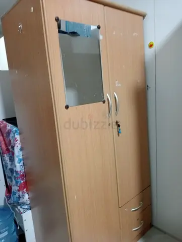 Used 2-door wooden wardrobe with mirror and drawers - good condition