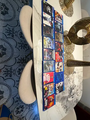 Mixed collection of PlayStation and Wii game discs with cases - used with limited edition game 19 cd