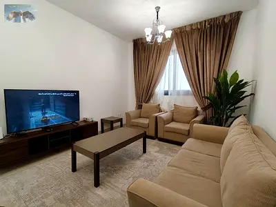 Furnished one-bedroom apartment with a living room – fully equipped with all home appliances – private parking inside the tower – prime location on Al