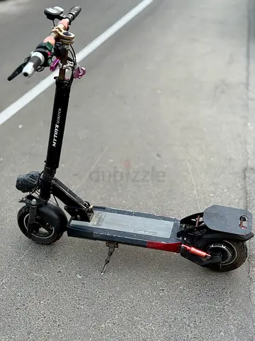 Used electric scooter working good condition10 wheels