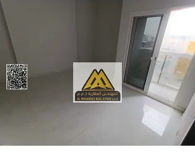 Two-bedroom apartment with living room in Al Jurf 3, Ajman, new building, balcony with open view, c