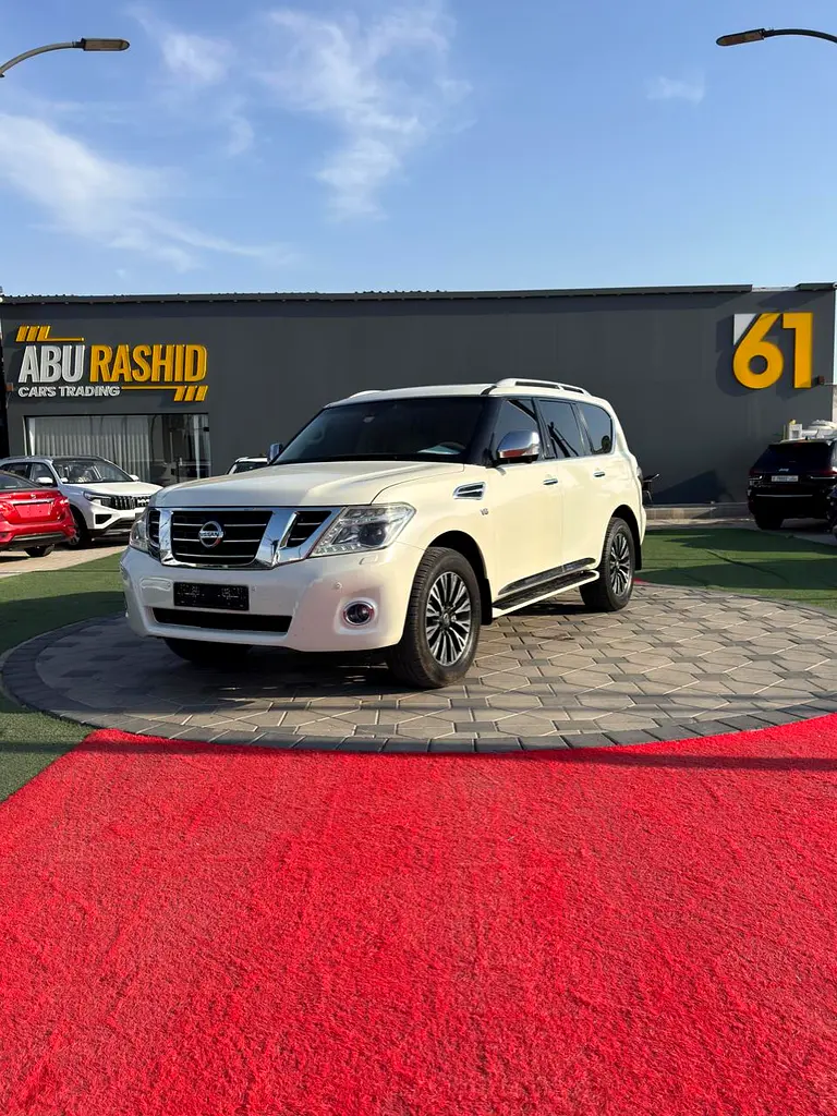 Nissan Patrol 2014 — photo 1 of 18