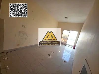 A spacious studio for annual rent in Al Hamidiya – Ajman, featuring a balcony with an open view in a prime location near the court and University Stre