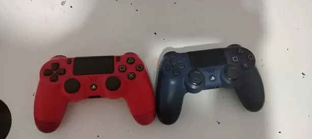 Two Sony DualShock 4 Wireless Controllers ORIGINAL — Red and Blue, Good Working Condition