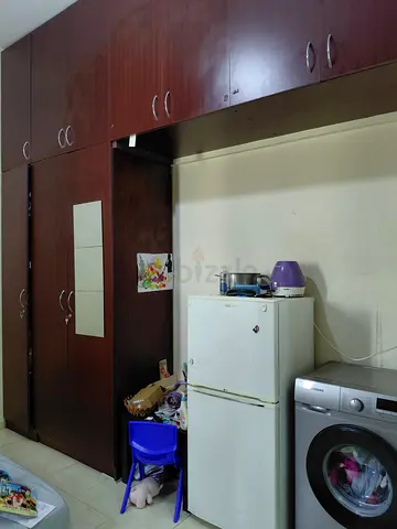 Room sharing for executive bachelor near Jabel ali Gardens