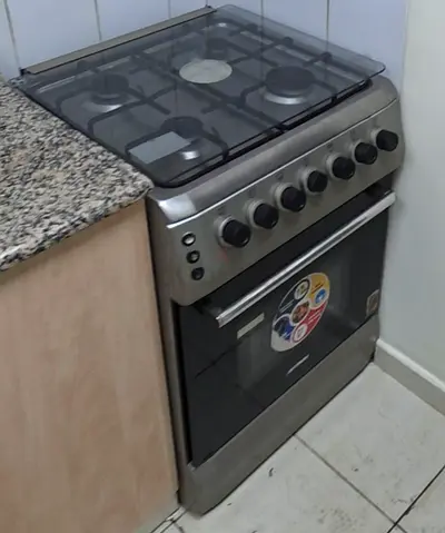 Stainless Steel Freestanding Gas Oven with 4 Burners - Good Working Condition