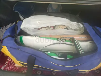 Cricket batting pads with kit bag - used, good condition. Also, 05 numbers of cricket bat and helmet