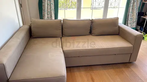 Light brown L-shaped fabric sofa with chaise - good condition