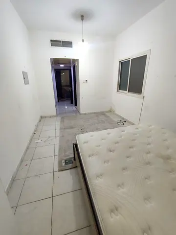 Studio for annual rent in Ajman, Al Nuaimiya 2, King Faisal Street.