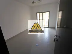 Two-bedroom apartment with a living room for rent in Al Jurf 3, with a balcony and central air condi