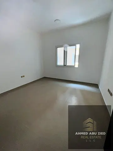 Spacious 1BHK for annual rent in Al Mowaihat 2 Ajman master room 2 bathrooms balcony open view large layout 35k yearly 4-6 cheques