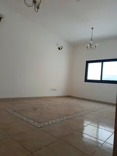 2 bedroom apartment Al Majaz 3 main road AC by owner wardrobes spacious layout close to services pri