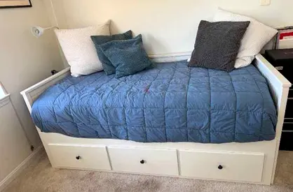 IKEA Hamnes Day bed with 3 storage drawers underneath and with 2 IKEA mattresses