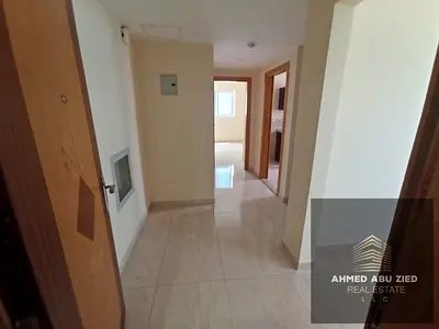 Luxury one-bedroom apartment with a living room, including parking. Features built-in wardrobes, 2