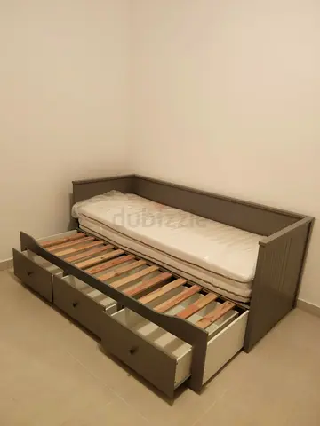 IKEA hamnes day bed with 3 big storage drawers underneath and with 2 IKEA mattresses is available