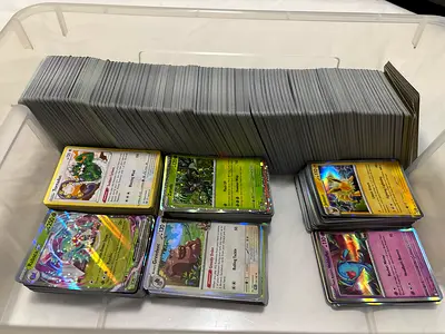 Large Collection of Pokémon Trading Cards - Hundreds of Cards, Includes Holo and reverse hollow.