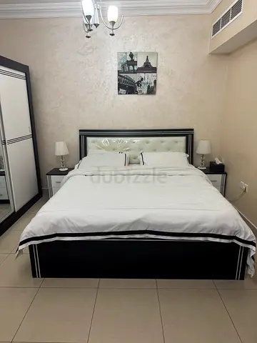 King size bed frame with headboard and matching bedside tables - black  white