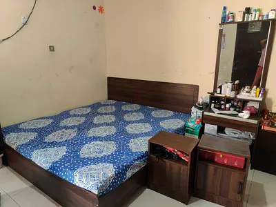 King size bed with mattress and mirror side table