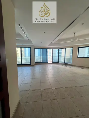 Annual Rental Luxury Apartment in Sharjah Al Majaz 1 Three Master Bedrooms Sea View Front and Back View Terrace Gym Swimming Pool Free Parking AC Cove