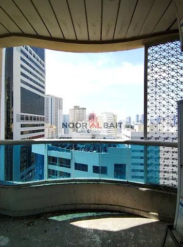 Spacious 2 BHK | Prime Location | Family Building | Free Parking I Easy Dubai Access