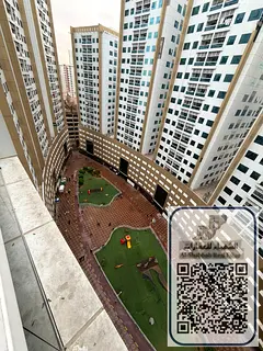 For sale: Studio apartment with separate kitchen in Al Rashidiya 1, Pearl Towers, with private parki