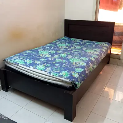 Single dark wood bed frame with headboard (good condition). Double size bed